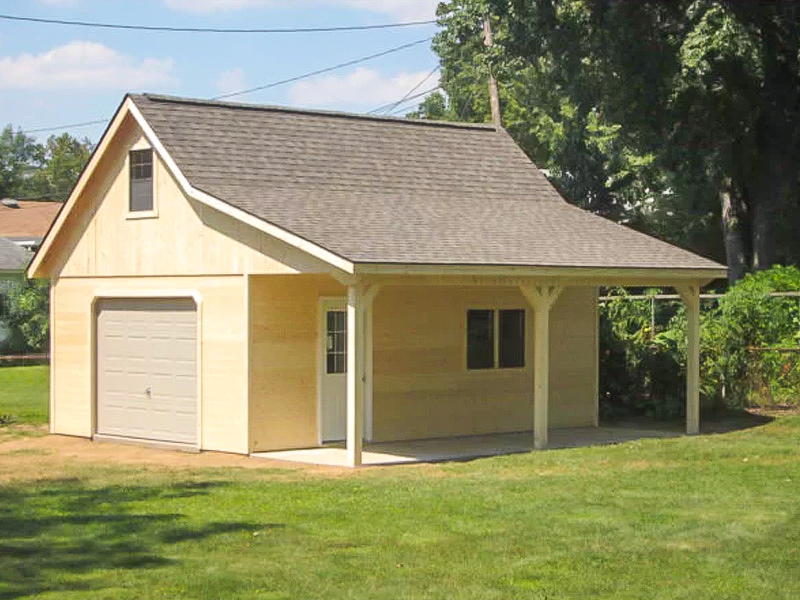 two story cabin with garage door
