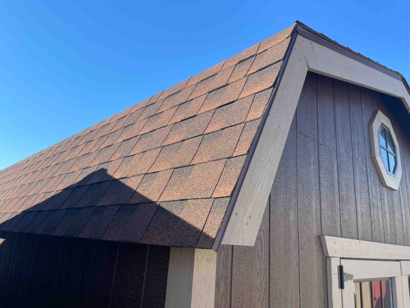 barn building with shingle roof