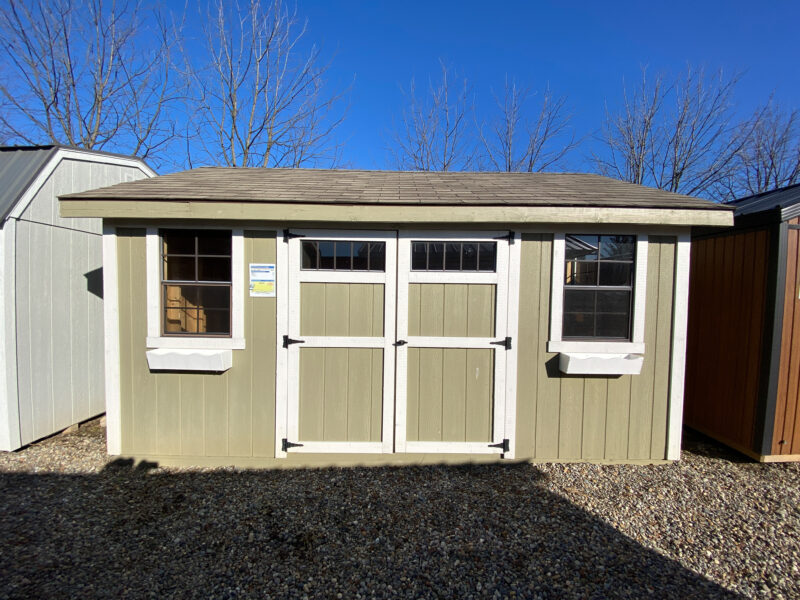 cottage shed with windows