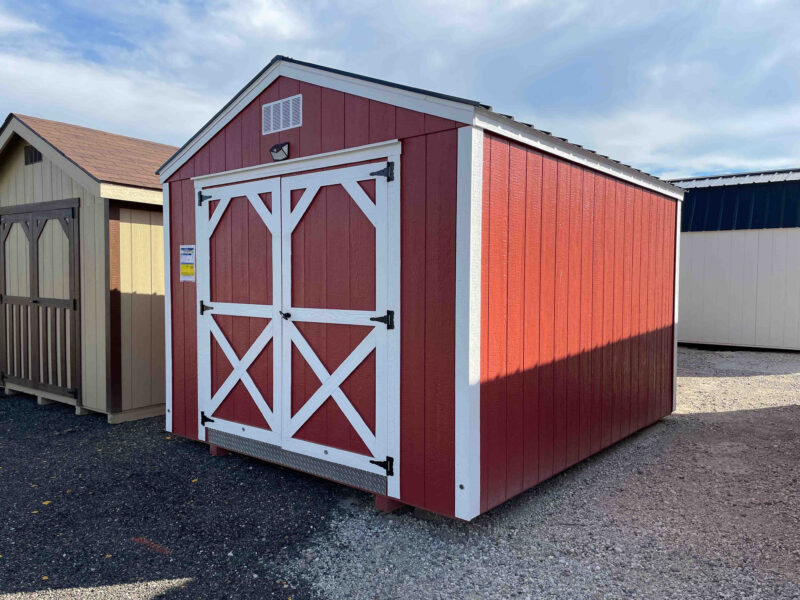 red shed with white trim