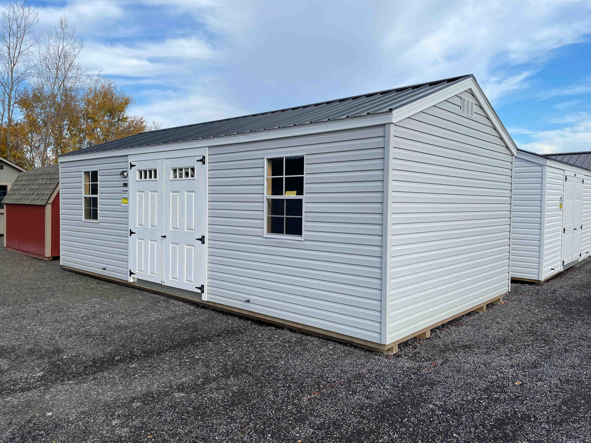 sheds with vinyl siding on sale