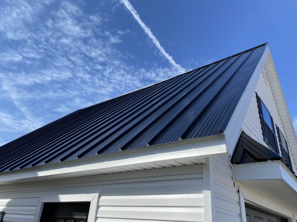 two car garage with metal roofing