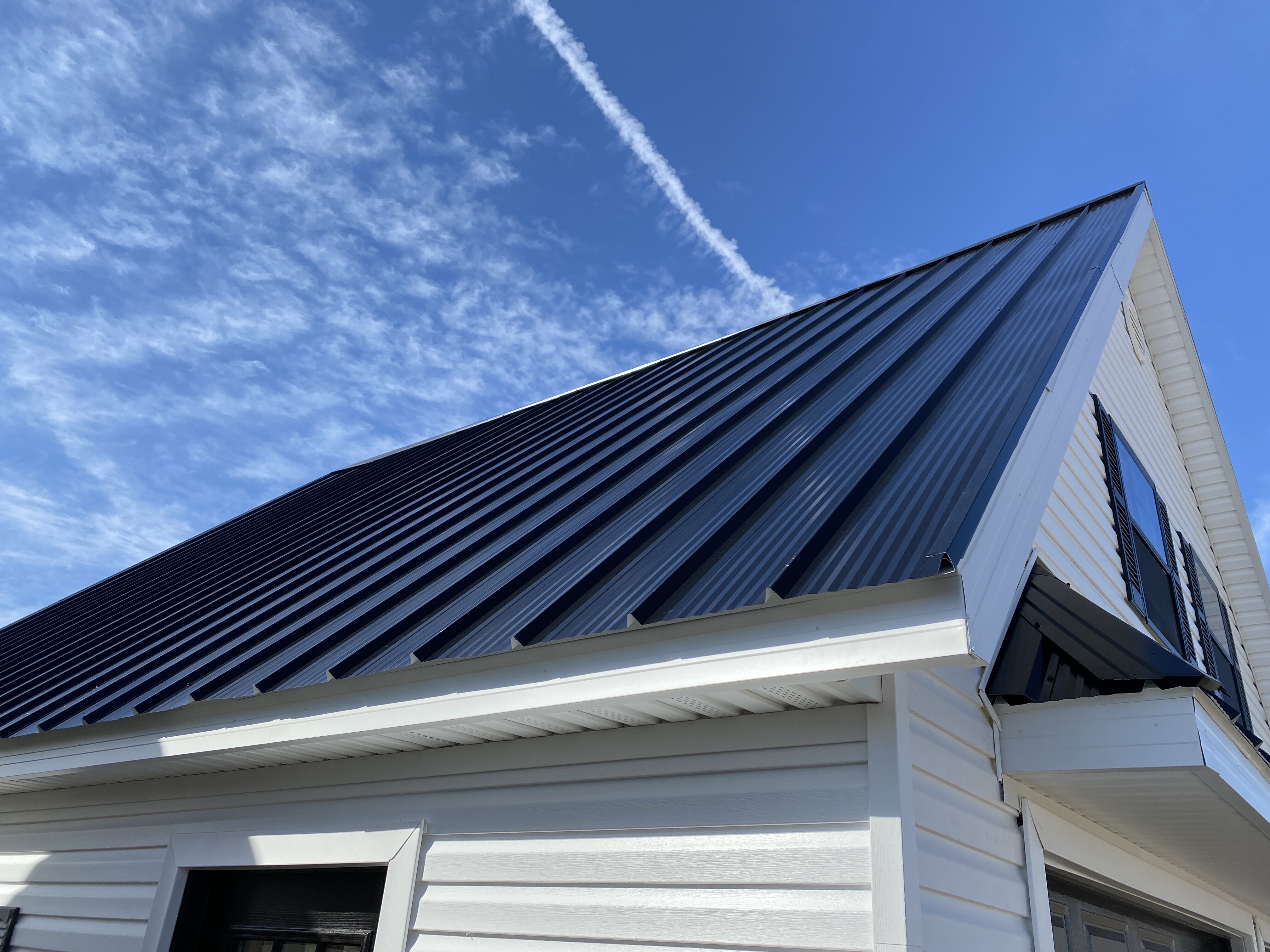 two car garage with metal roofing